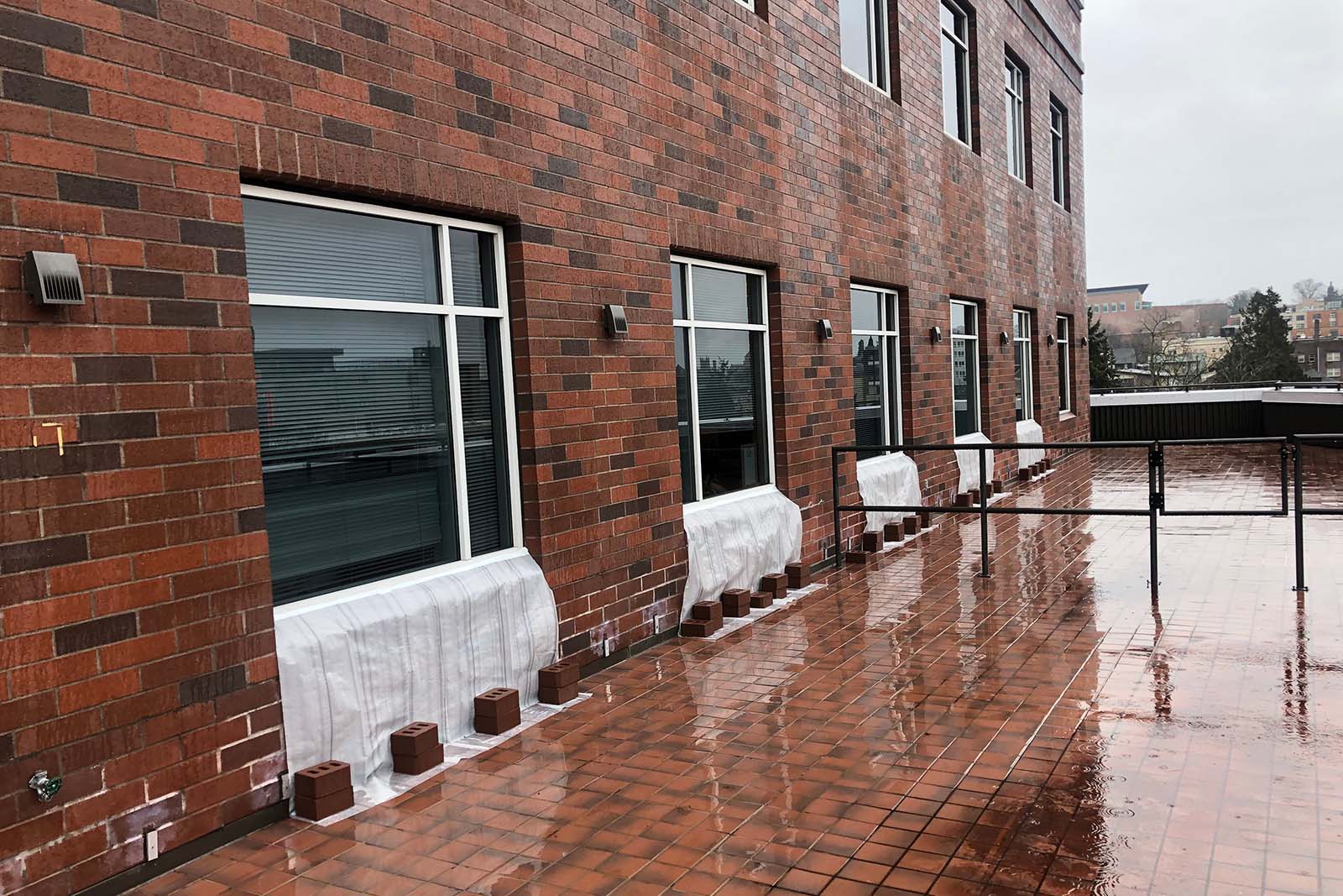 Brick building in the rain leak testing